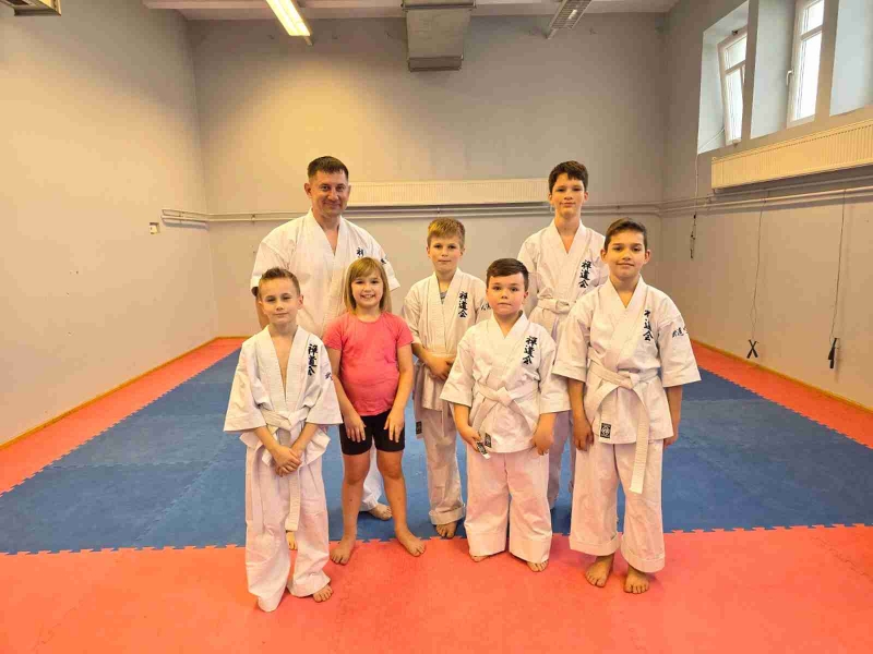 Roman Drobiazko mit den kleinen Sportler.