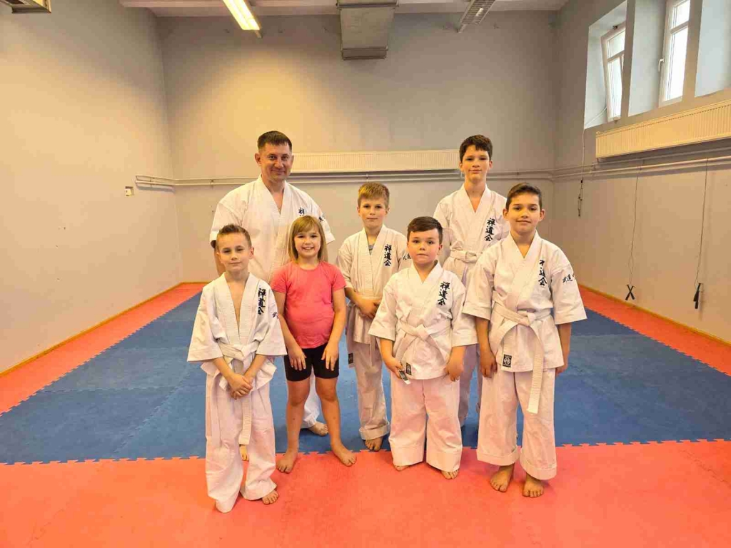 Roman Drobiazko mit den kleinen Sportler.